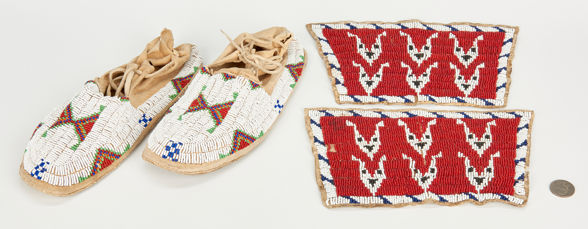 Lot 587: Pair of Sioux Beaded Moccasins and Plains Cuffs