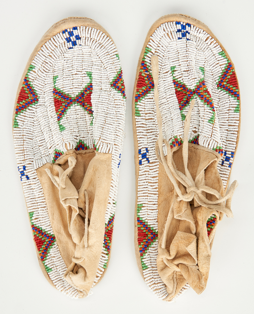 Lot 587: Pair of Sioux Beaded Moccasins and Plains Cuffs