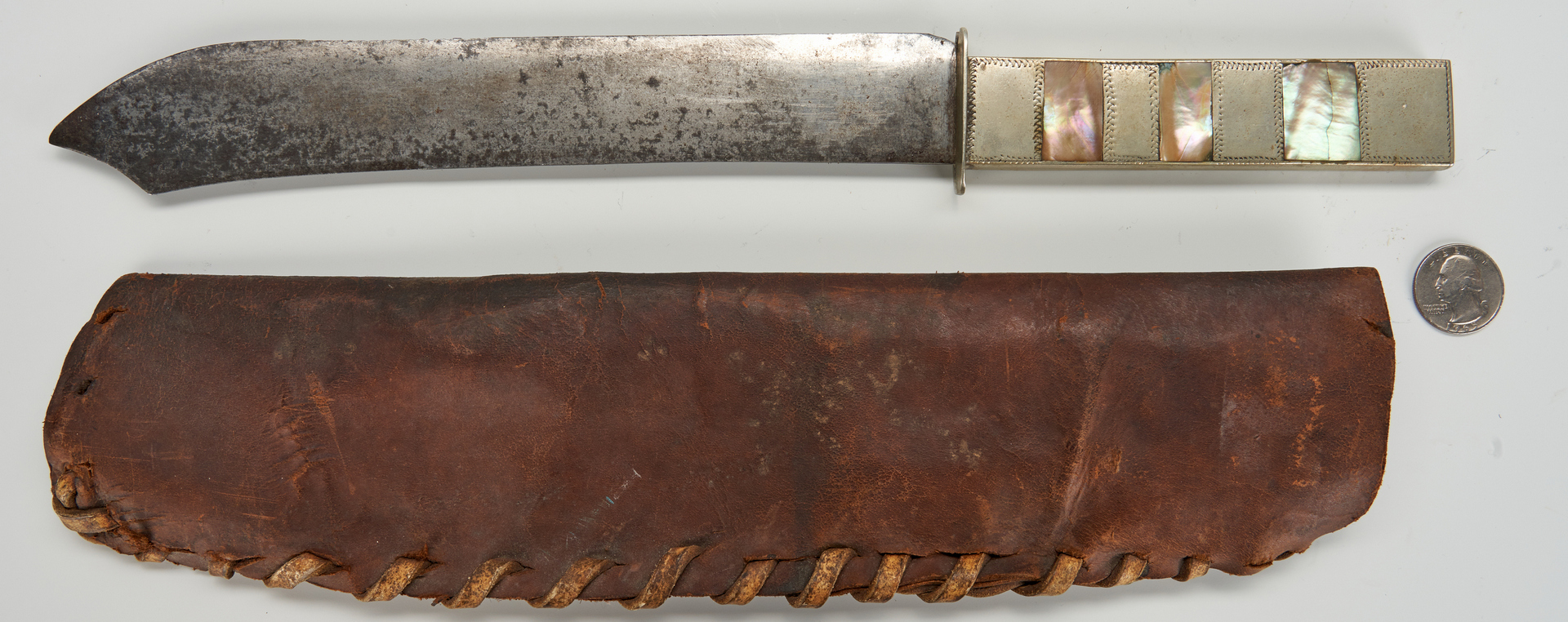 Lot 612: Abalone Handle Knife with Leather Sheath, with provenance