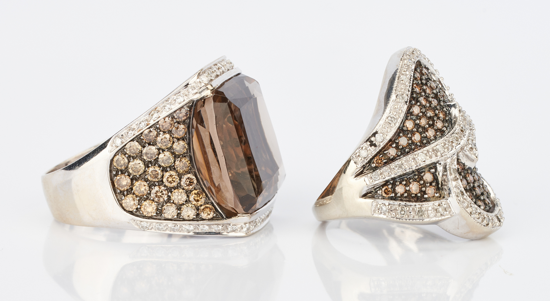 Lot 722: 2 Gold & Colored Gemstone Rings, incl. David Morris