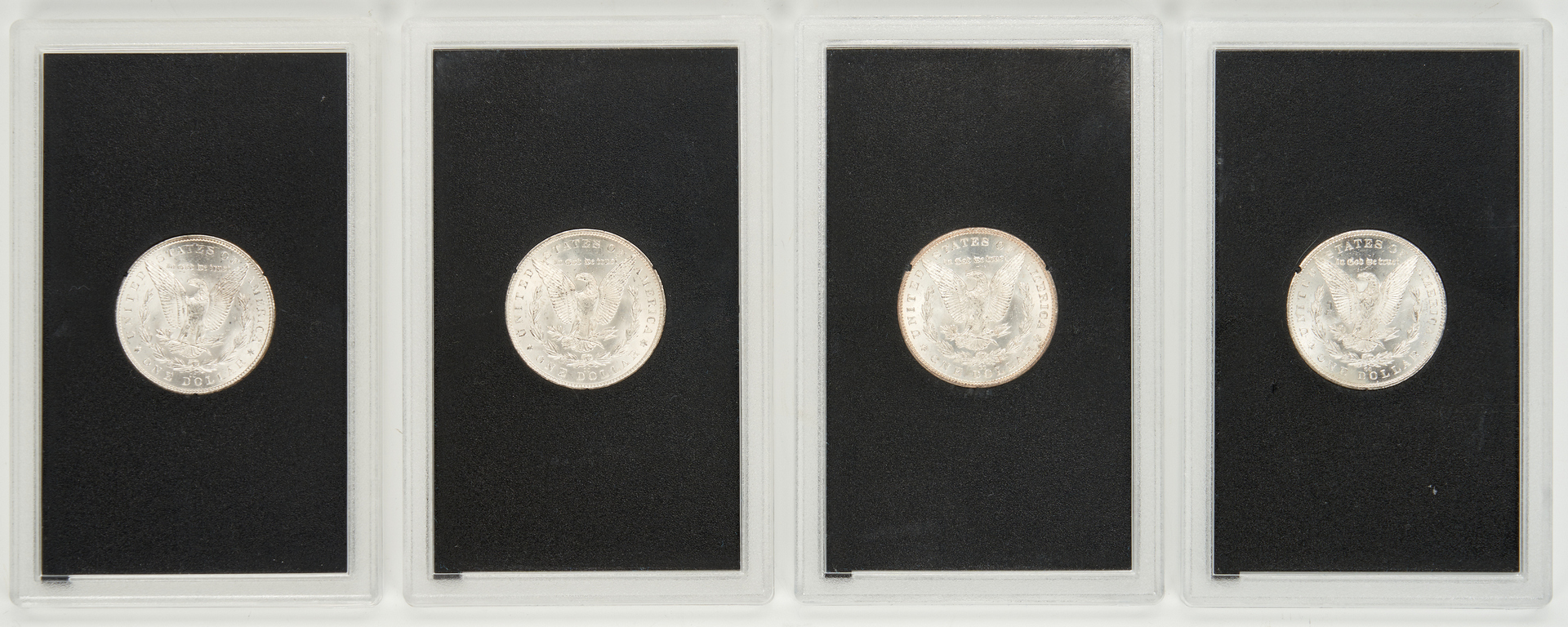 Lot 741: 4 GSA Morgan CC Silver Dollars, Uncirculated & Mixed