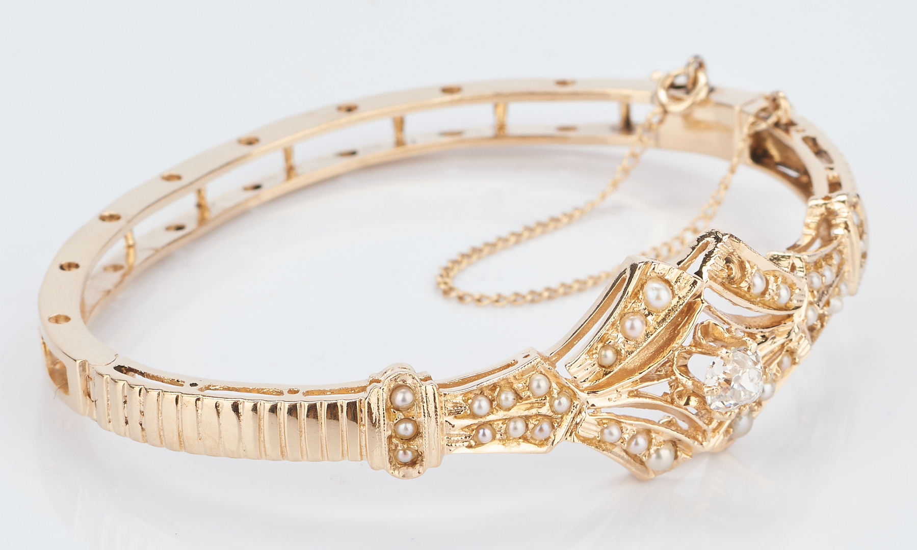 Lot 776: 14K Victorian Diamond & Pearl Bangle Bracelet