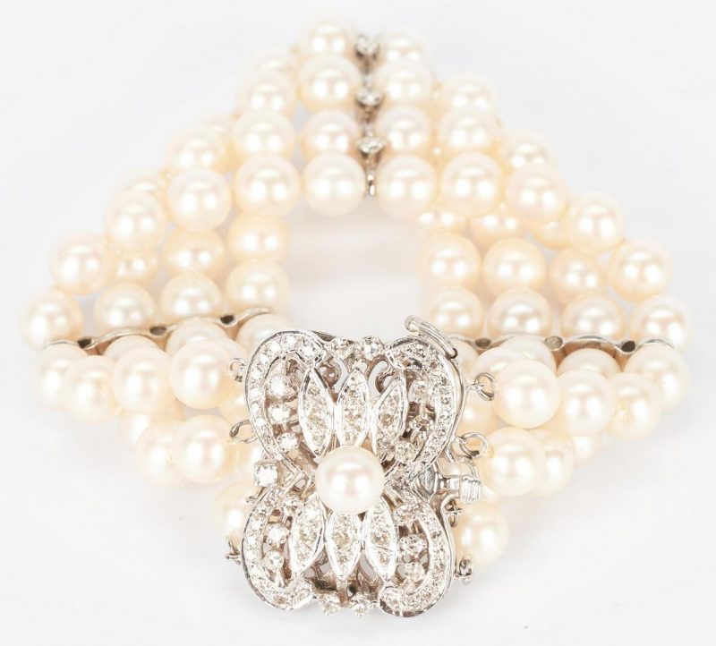 Lot 778: 14K Four Strand Pearl & Diamond Bracelet