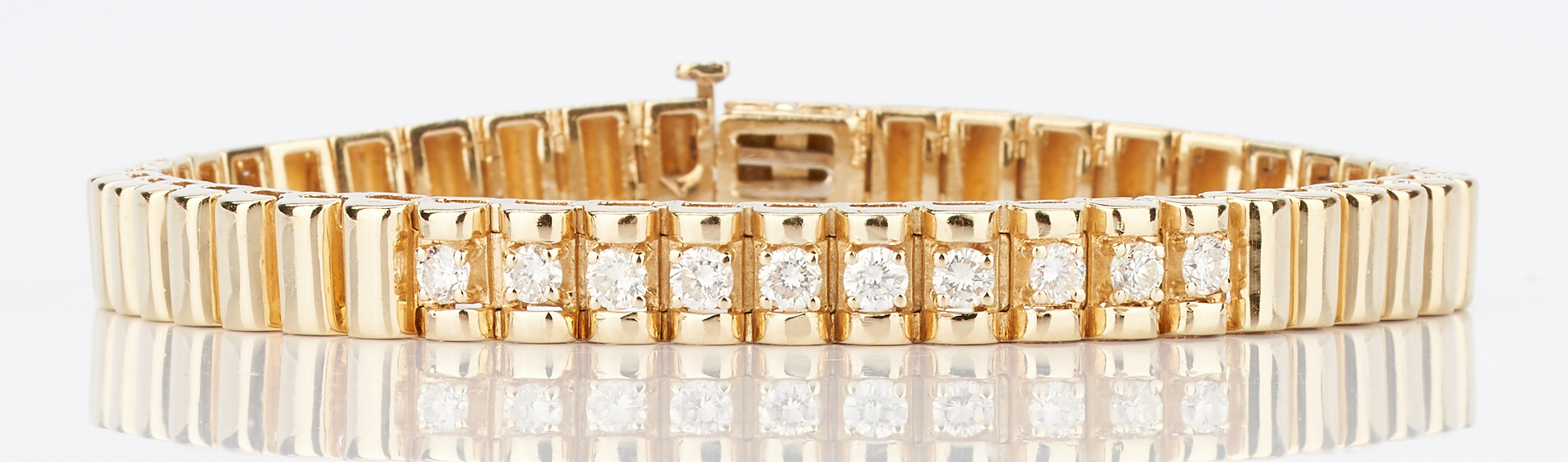 Lot 782: Ladies 14K Gold & Diamond Bracelet