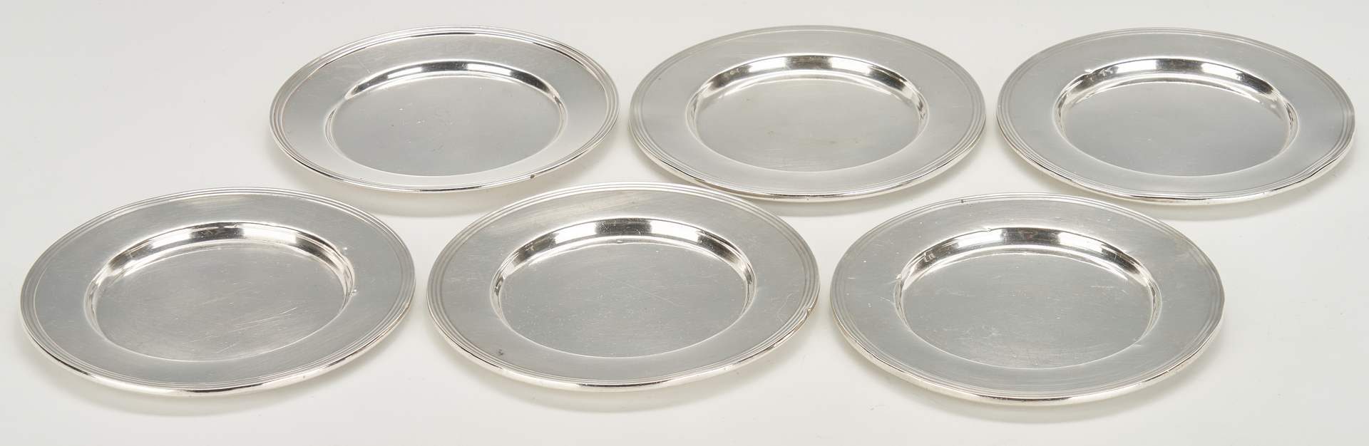Lot 807: 11 pcs  Holloware: Bread Plates, Kirk candy dishes