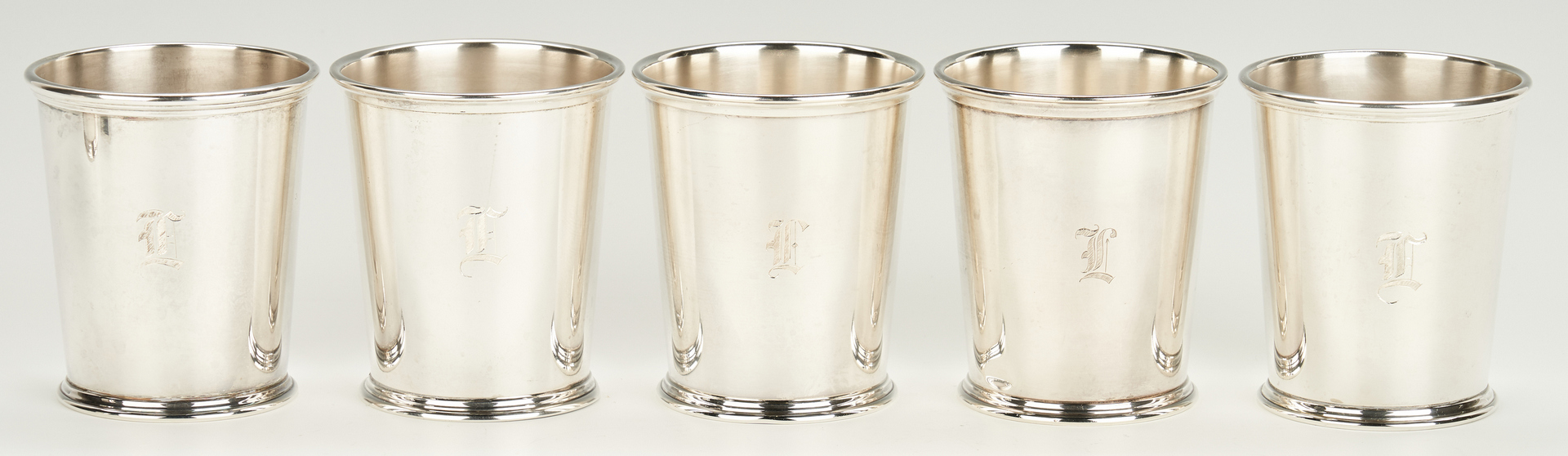 Lot 946: 7 Kirk & Son Sterling Julep Cups & 2 Match Boxes