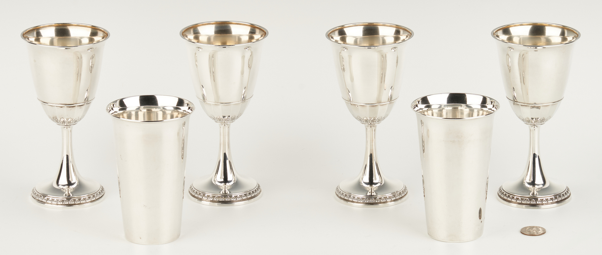 Lot 1046: 4 Sterling Silver Goblets and 2 tall beakers