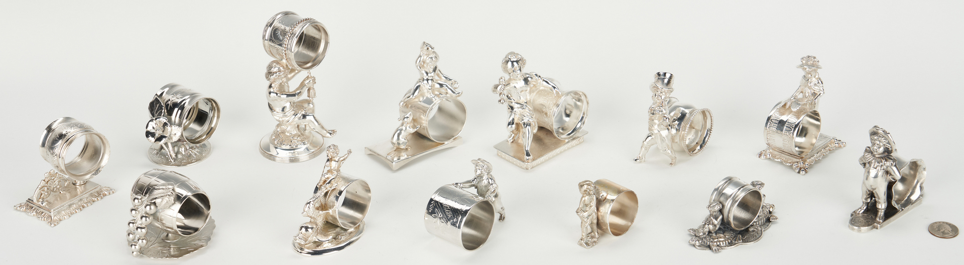 Lot 250: 13 Silverplated Napkin Rings incl. Figural Children