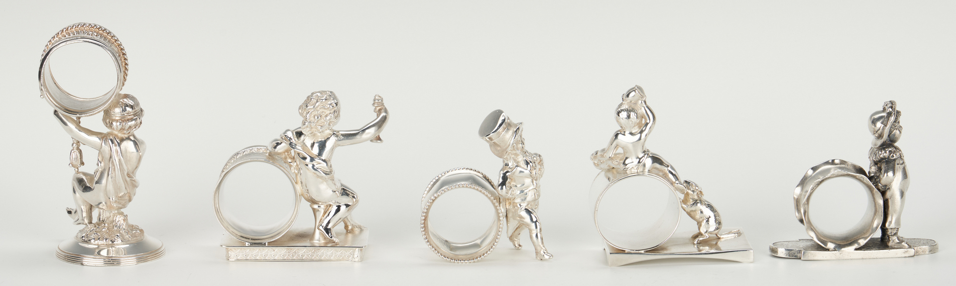 Lot 250: 13 Silverplated Napkin Rings incl. Figural Children