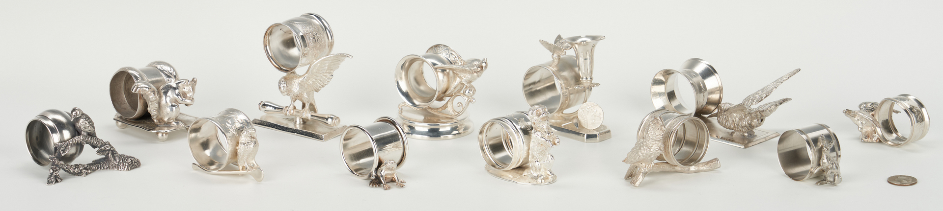 Lot 251: 12 Silverplated Napkin Rings, incl. Animals
