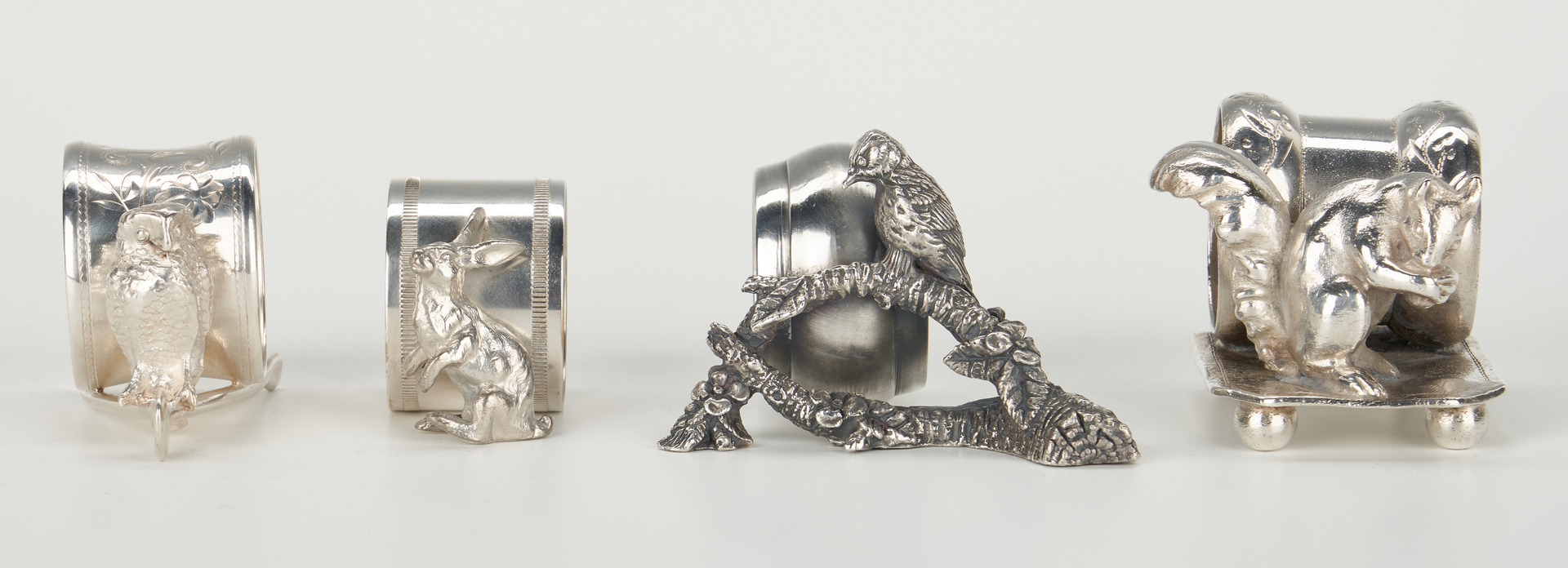 Lot 251: 12 Silverplated Napkin Rings, incl. Animals