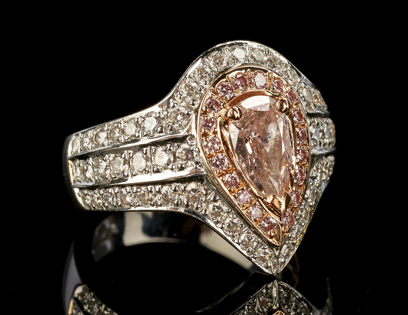 Lot 36: Ladies Platinum and Rose Gold Diamond Ring