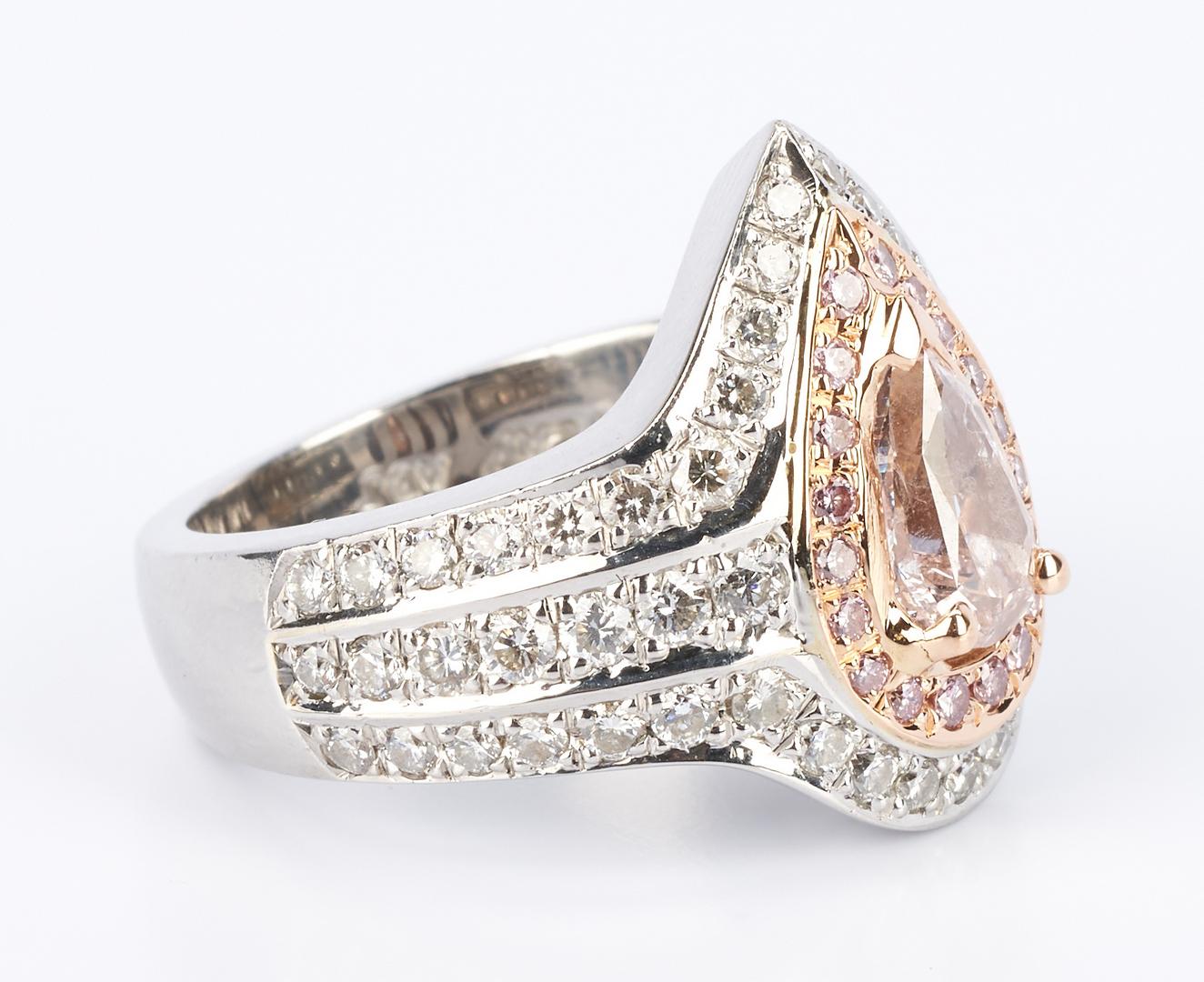 Lot 36: Ladies Platinum and Rose Gold Diamond Ring