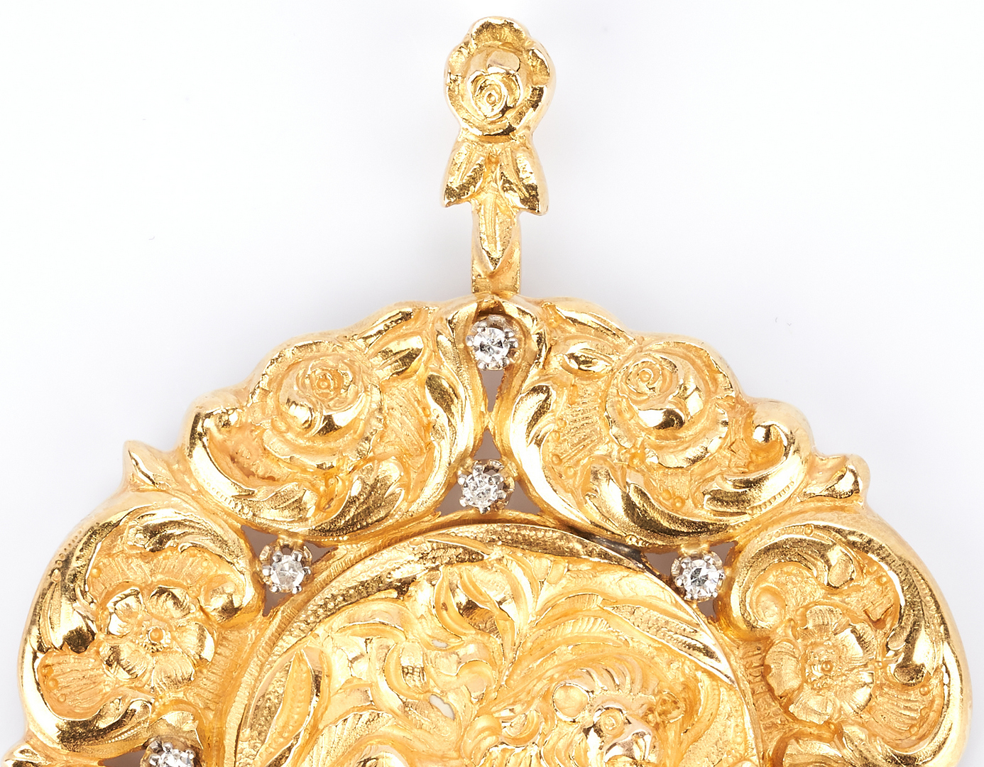 Lot 418: 22K Gold and Diamond Lion and Flower Pendant