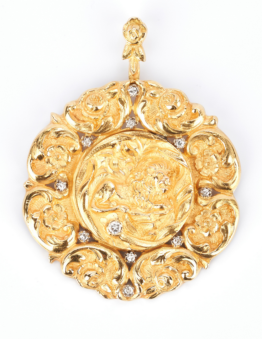 Lot 418: 22K Gold and Diamond Lion and Flower Pendant