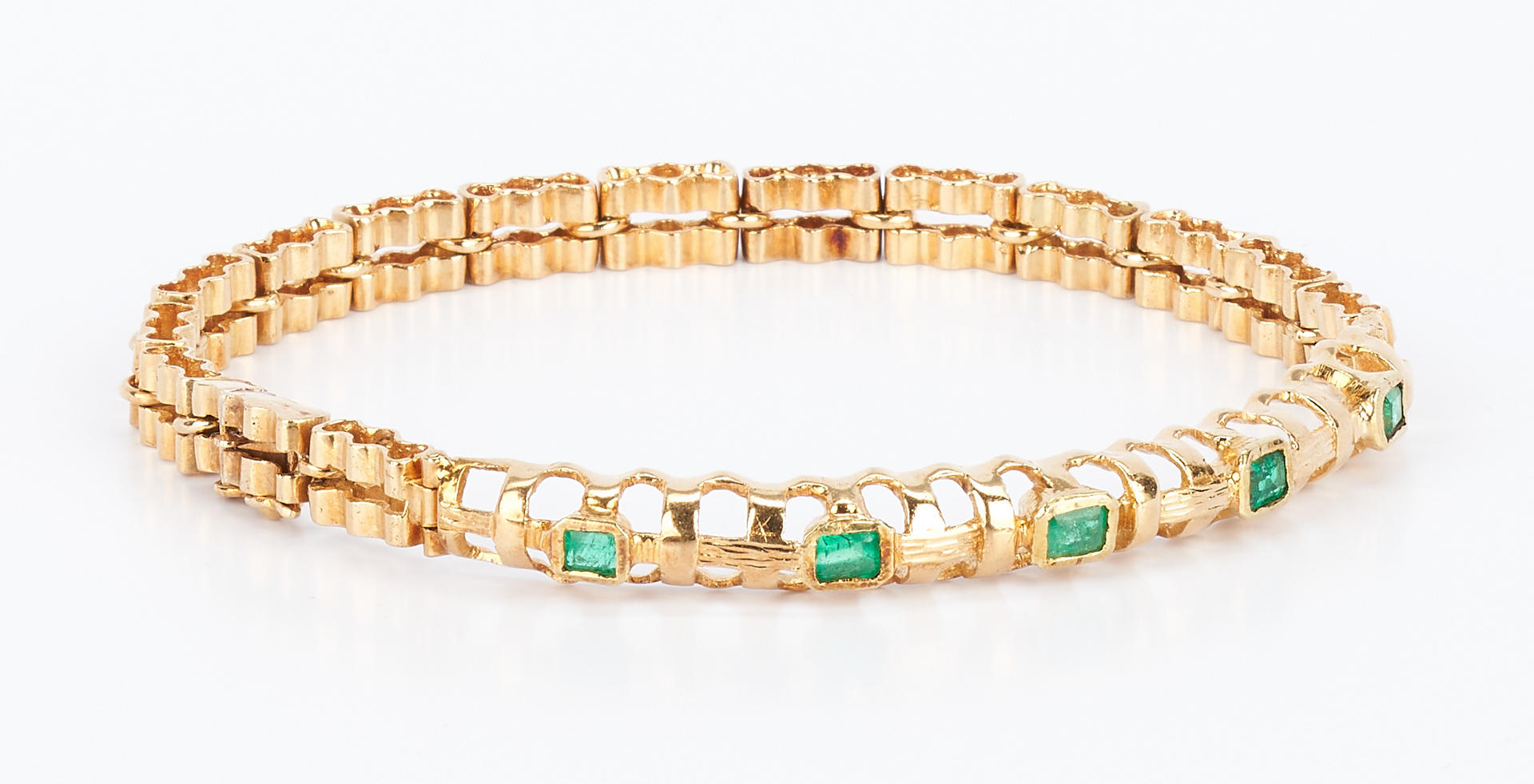 Lot 434: 22K Gold and Emerald Bracelet