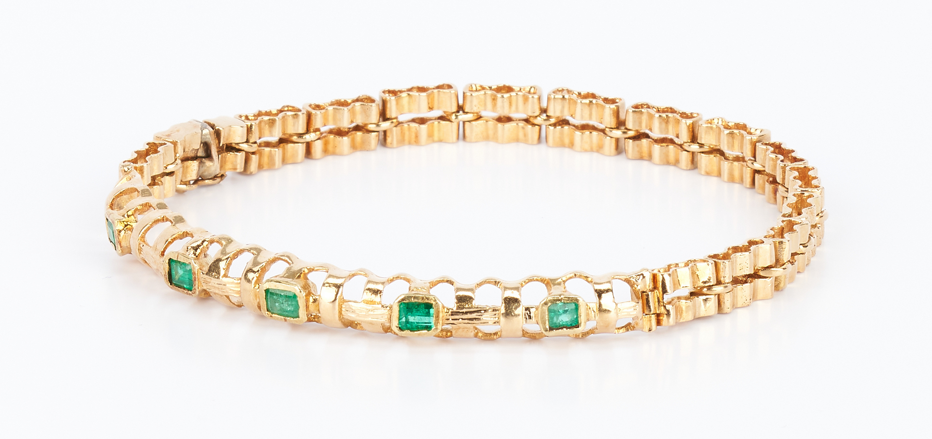 Lot 434: 22K Gold and Emerald Bracelet