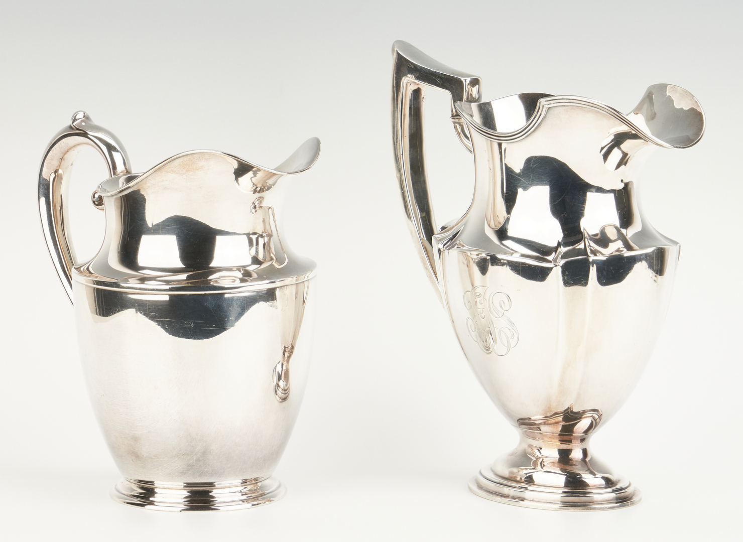 Lot 450: 2 Sterling Water Pitchers, Gorham and Wallace