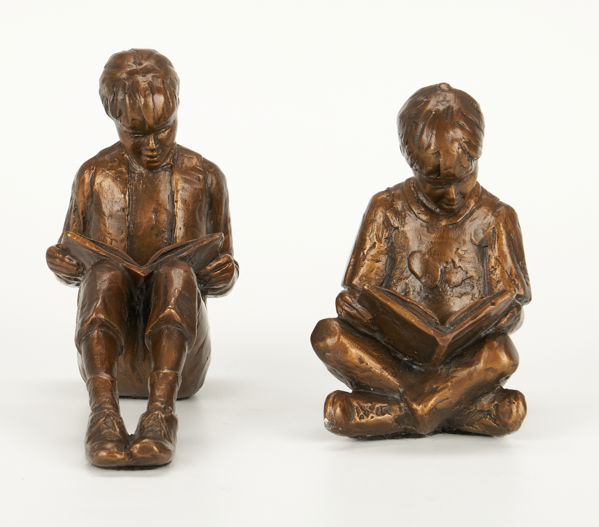 Lot 557: 4 Gary Price Bronze Sculptures of Children