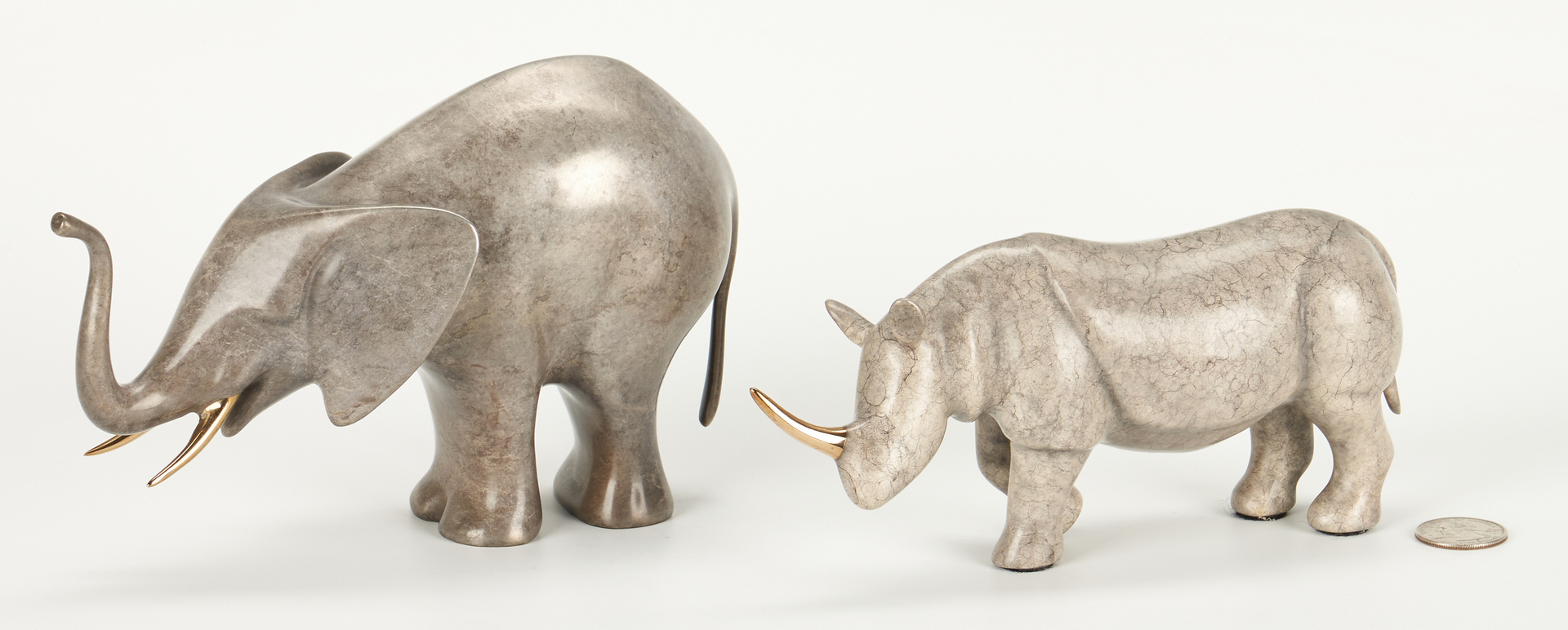 Lot 693: Loet Vanderveen Elephant and Rhino Figurines