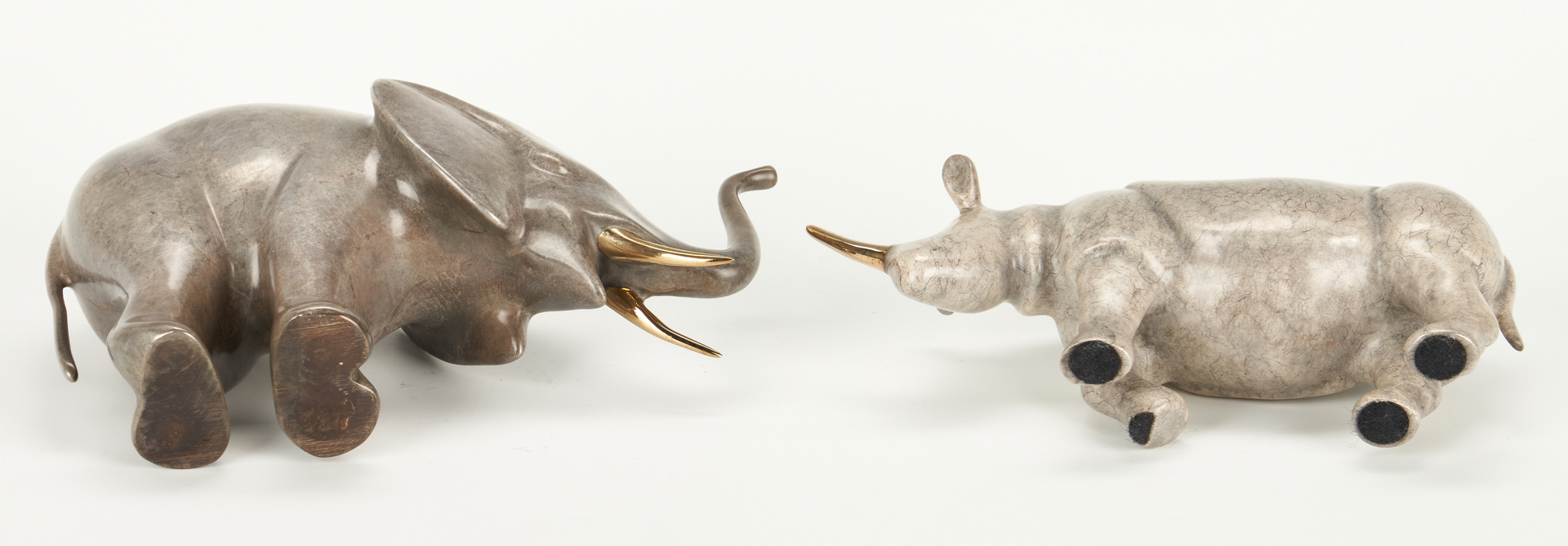 Lot 693: Loet Vanderveen Elephant and Rhino Figurines