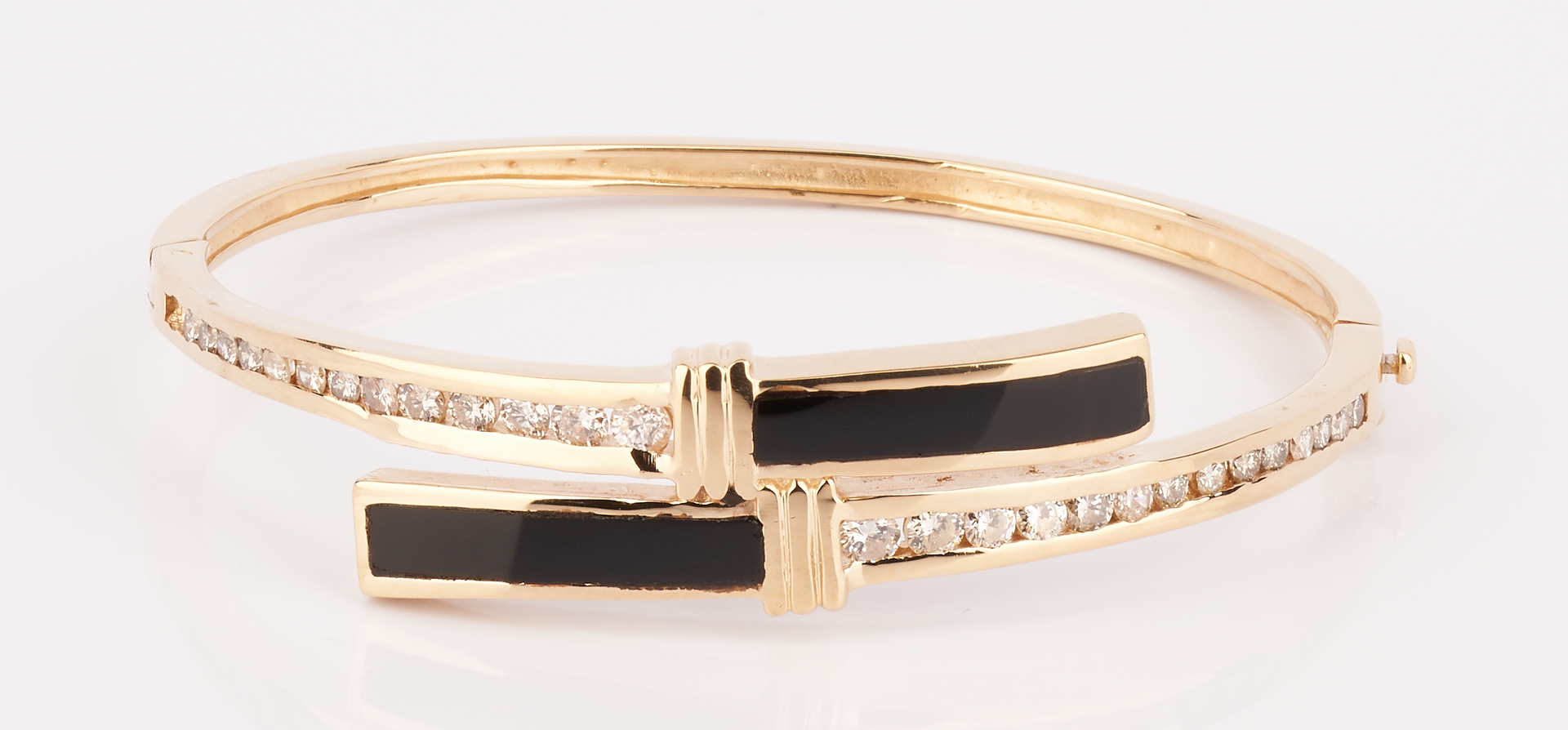 Lot 729: Ladies 14K Black Onyx & Diamond Bangle Bracelet