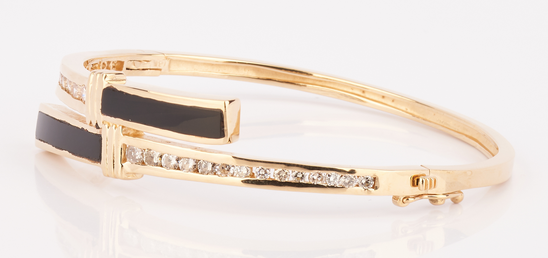 Lot 729: Ladies 14K Black Onyx & Diamond Bangle Bracelet