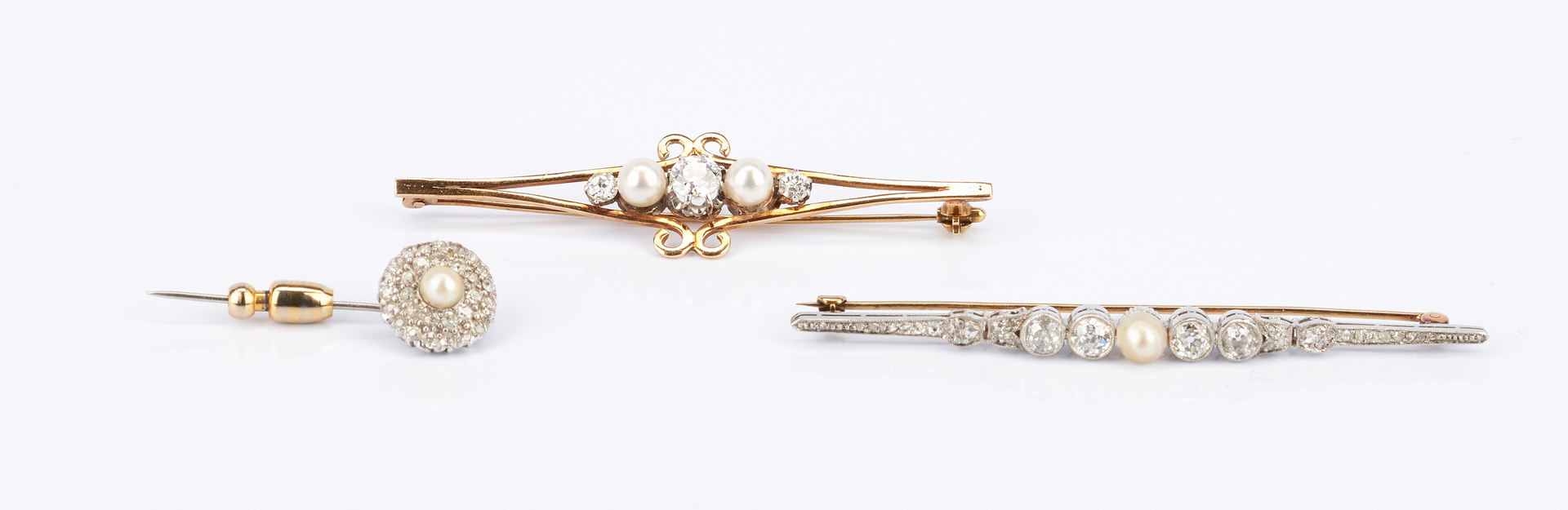 Lot 732: 3 Ladies Diamond and Pearl Brooches