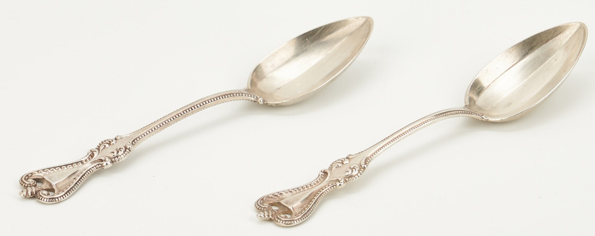 Lot 752: 27 pcs flatware incl. gilt-silver platter spoon