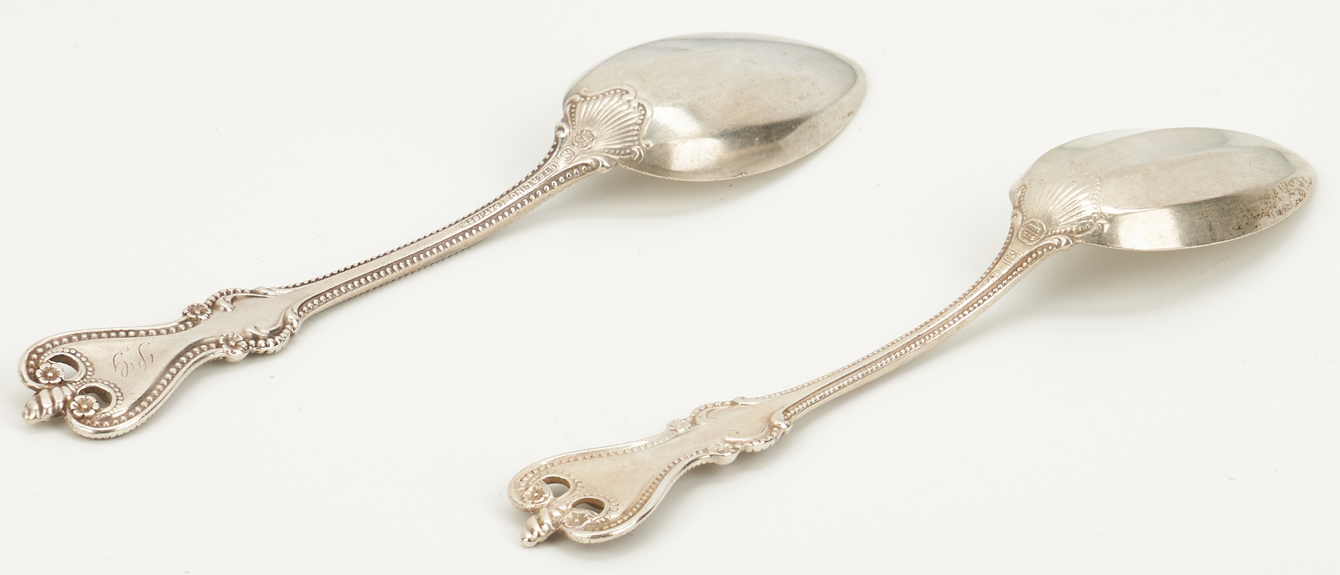 Lot 752: 27 pcs flatware incl. gilt-silver platter spoon