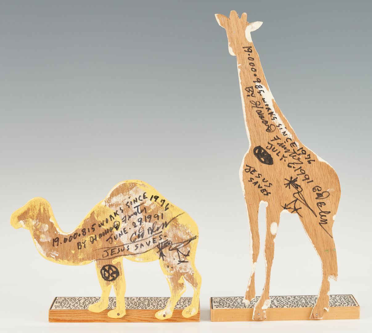 Lot 154: Howard Finster Folk Art Camel & Giraffe Bookends