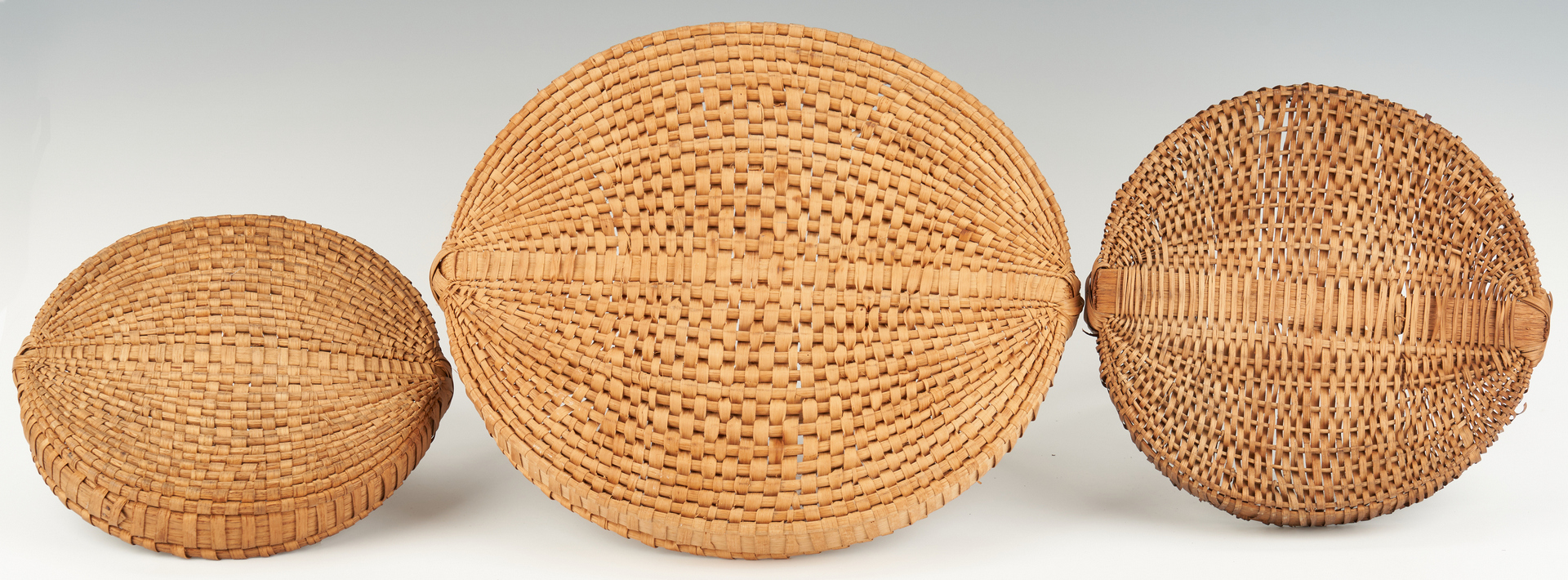 Lot 204: 3 Southwest VA Flat Baskets incl. Pie Form