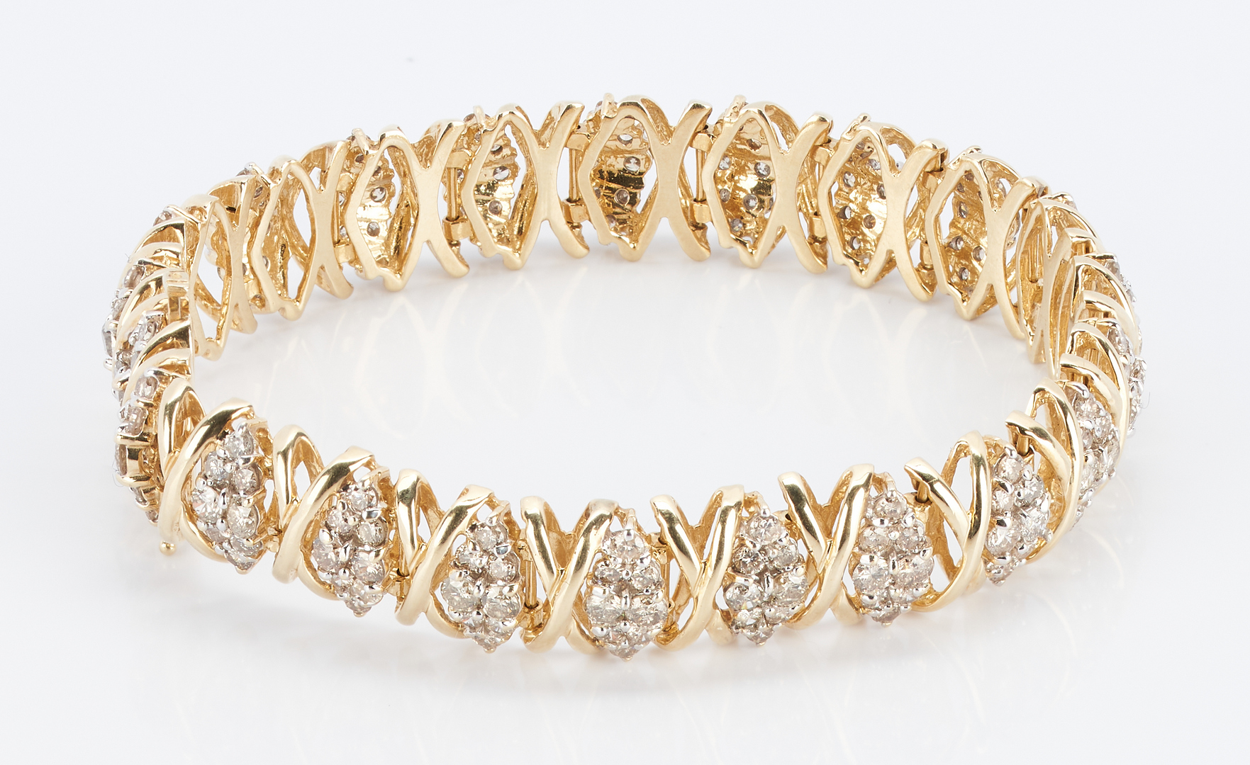 Lot 272: 14K Diamond Bracelet, XO Design