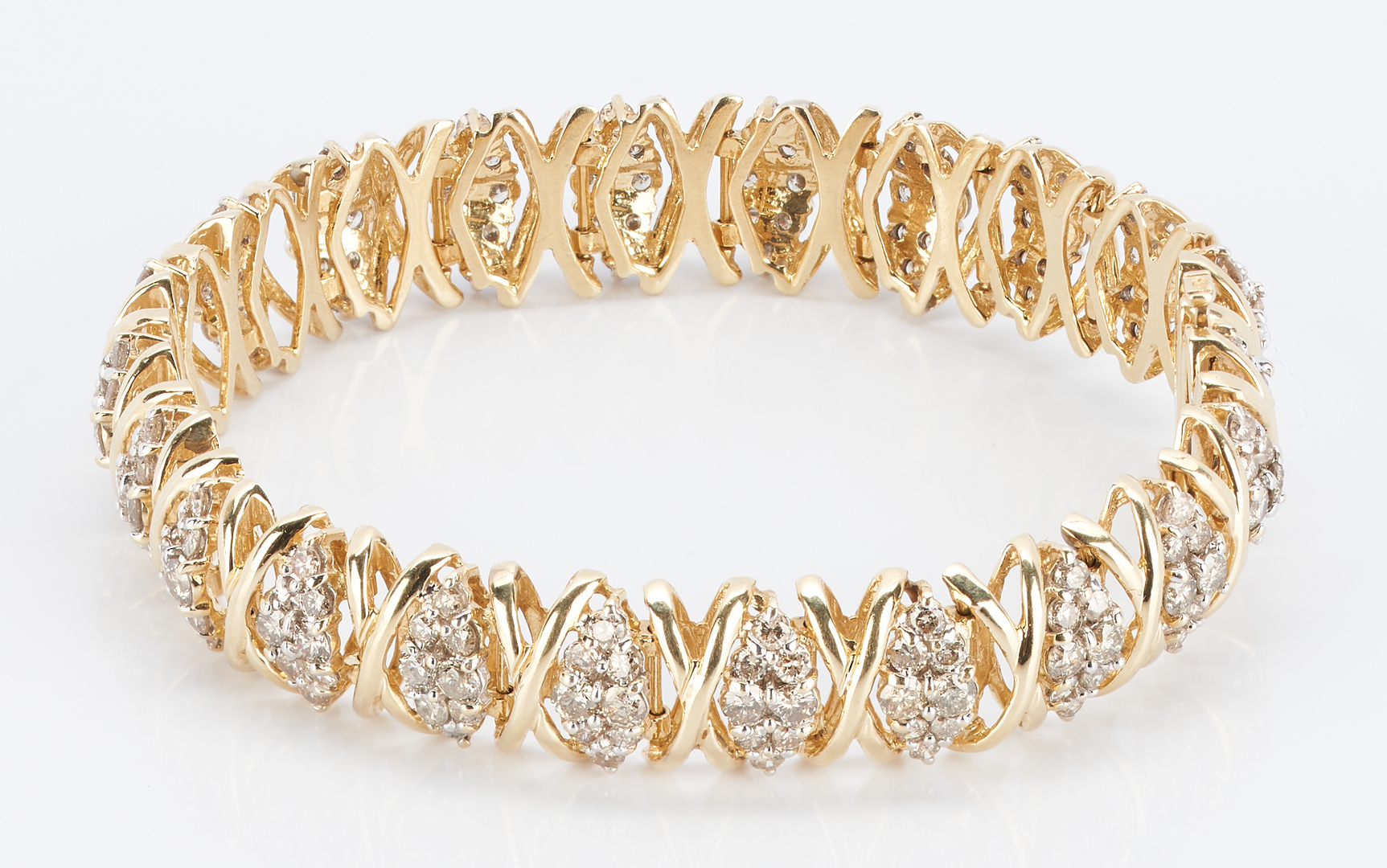 Lot 272: 14K Diamond Bracelet, XO Design