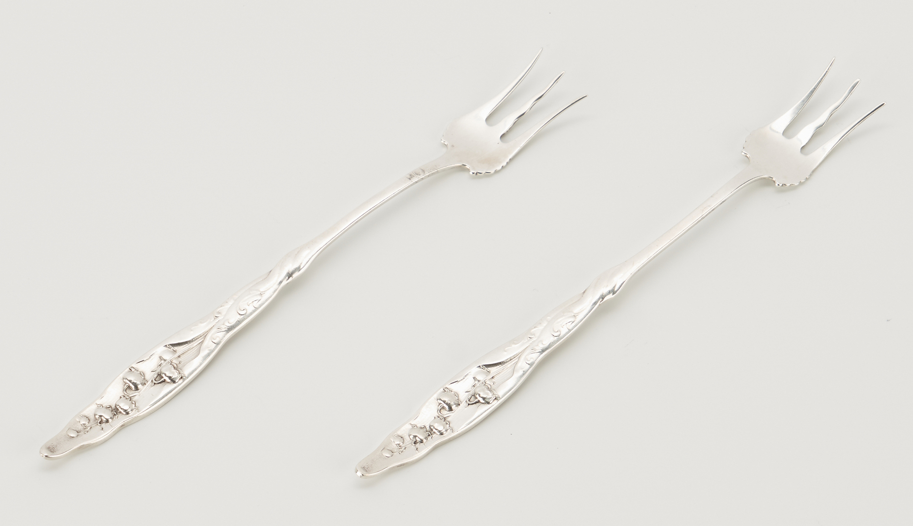 Lot 296: 50 Pcs. Whiting Lily of the Valley Sterling Flatware