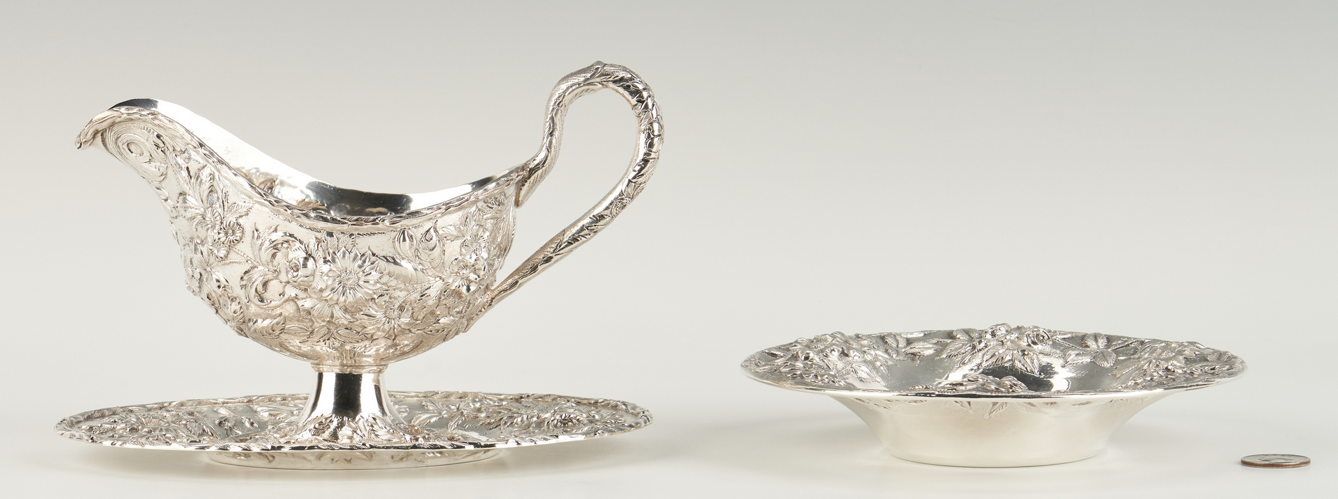 Lot 529: Kirk Repousse Silver Gravy Boat and Candy Dish