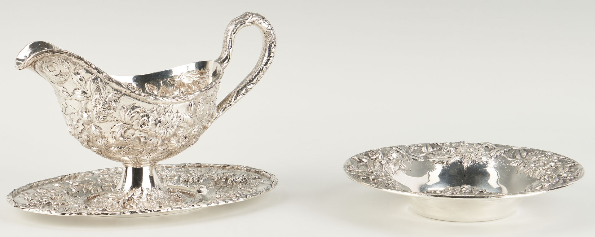 Lot 529: Kirk Repousse Silver Gravy Boat and Candy Dish