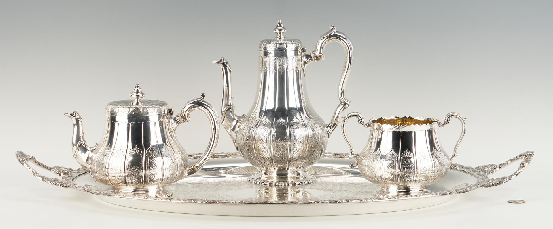 Lot 80: Victorian "Moresque" 3 pcs. Sterling Tea Set plus S/P Oval Tray