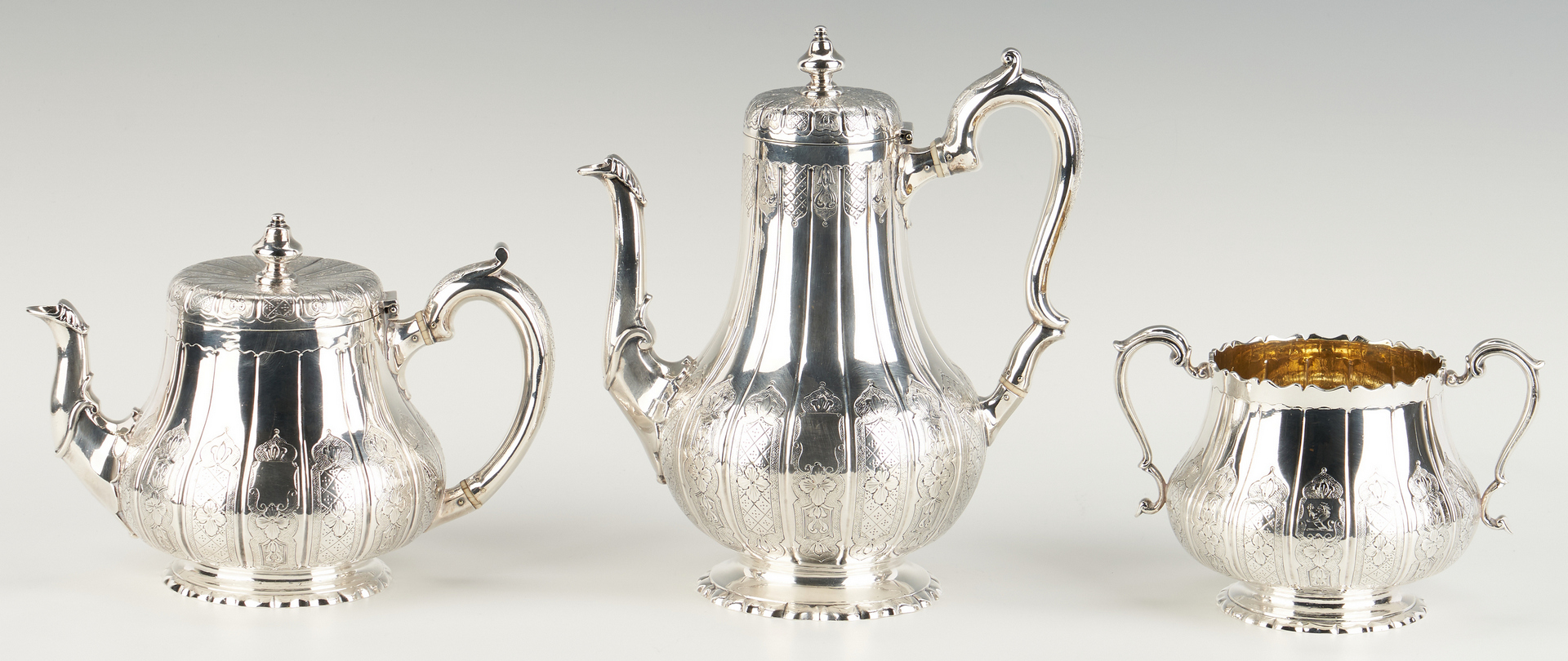 Lot 80: Victorian "Moresque" 3 pcs. Sterling Tea Set plus S/P Oval Tray