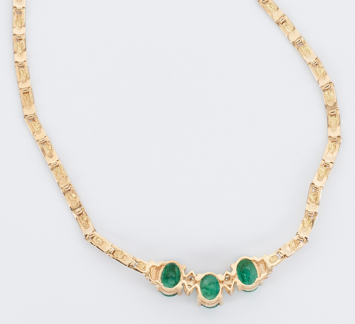 Lot 915: 14K Emerald and Diamond Necklace