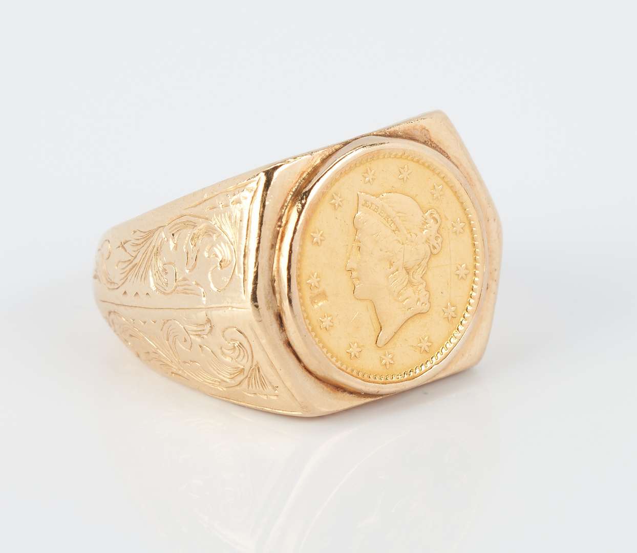Lot 930: 14K Gold and $1 Gold Coin Ring