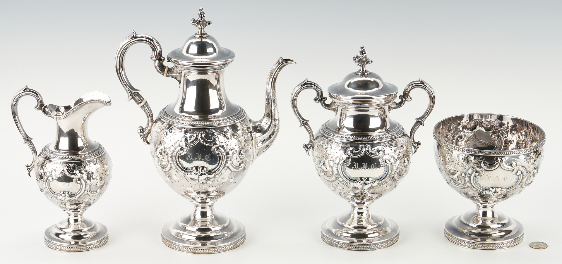Lot 108: American Repousse Coin Silver Tea Service, NY