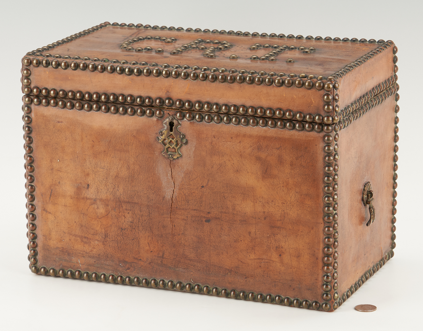 Lot 1169: European Leather Storage Box & Near East or Asian Brass Box, 2 items