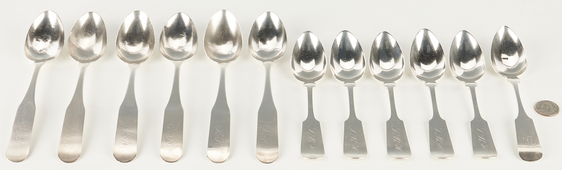 Lot 319: 12 Coin and Sterling Silver Spoons inc. Nashville, Negrin