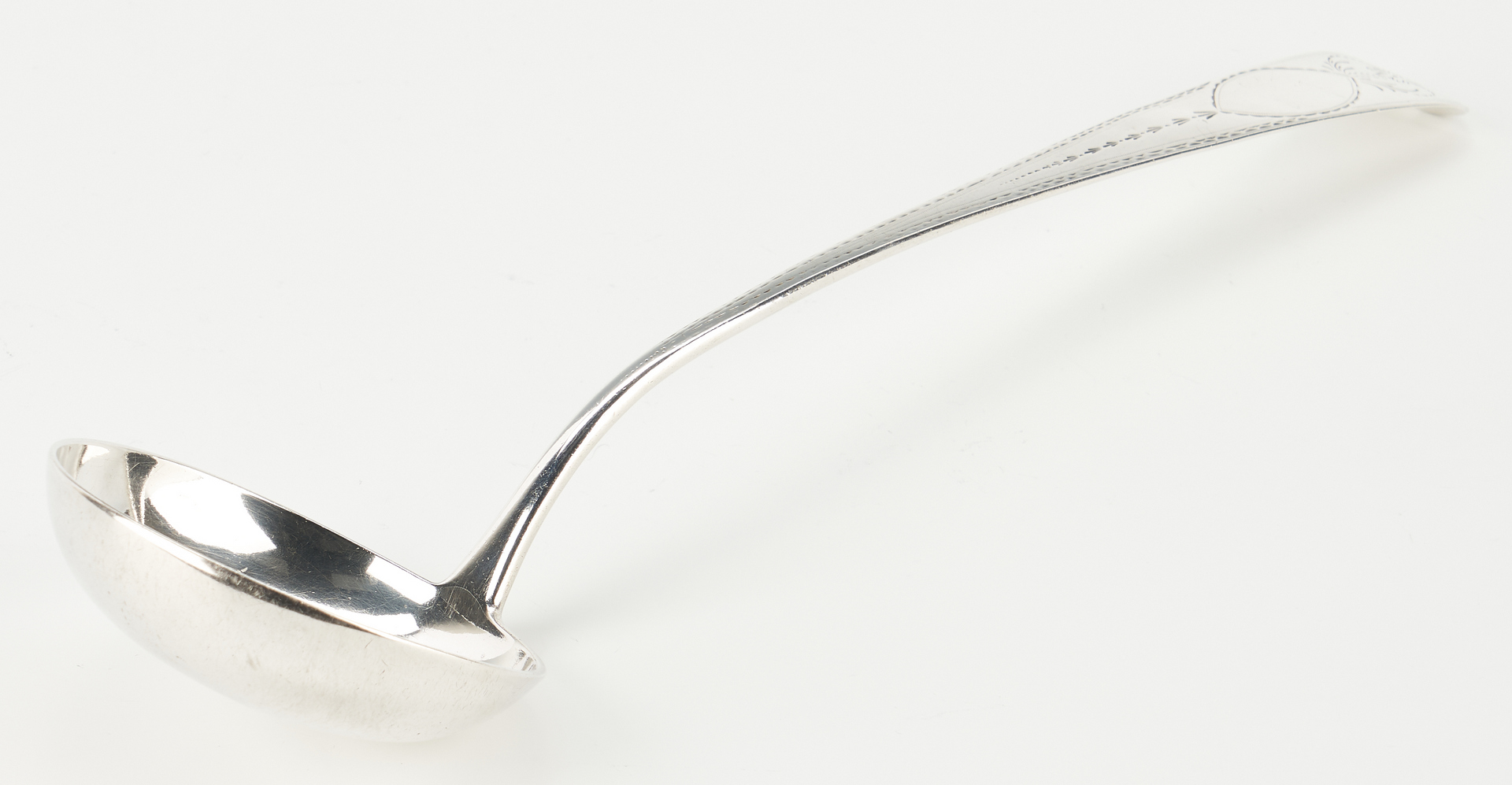 Lot 321: Baltimore coin silver ladle, Stone and Warner, Overstruck