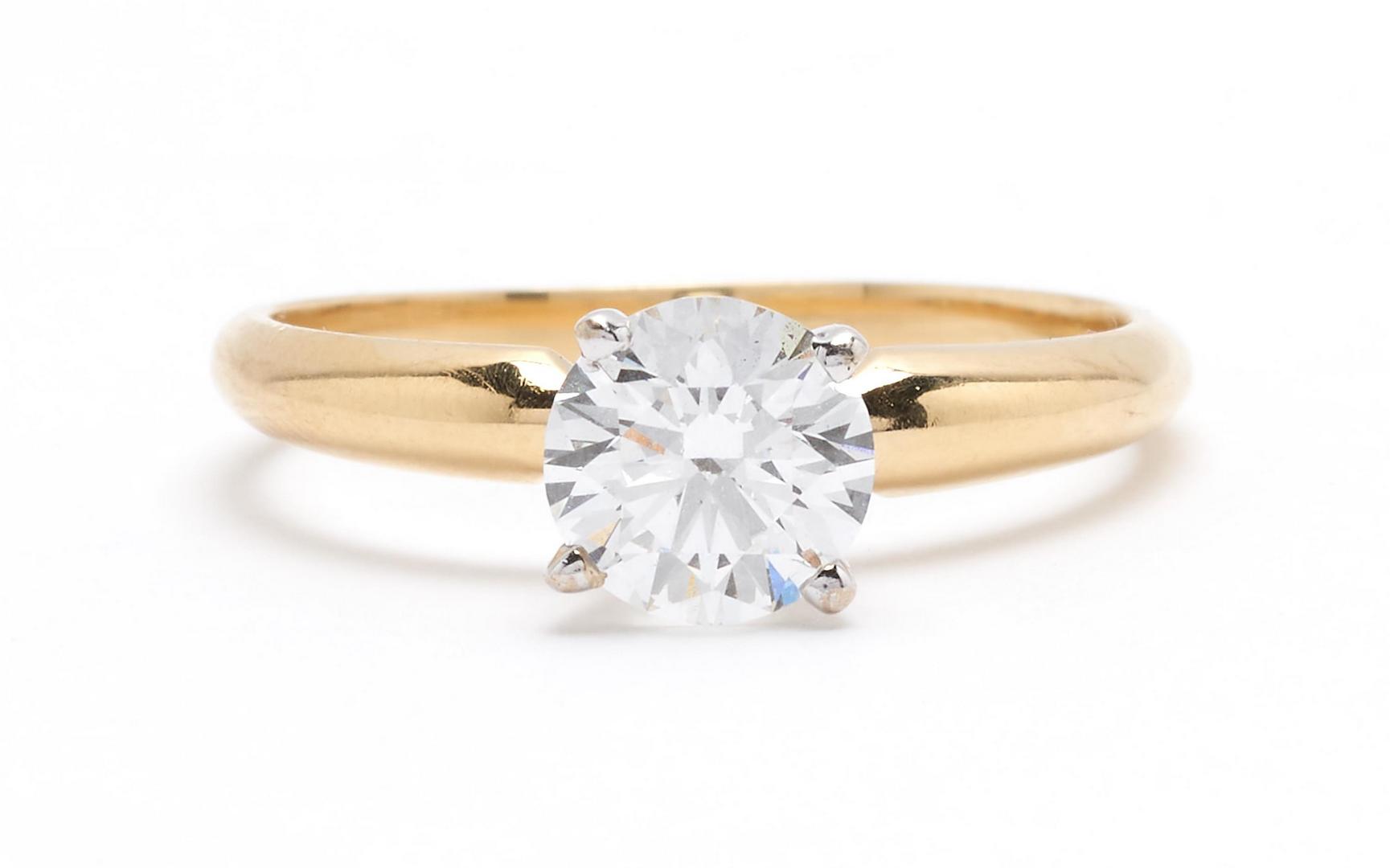 Lot 43: 1.03 Carat GIA Diamond Ring, F Color and 18K Dia. Band