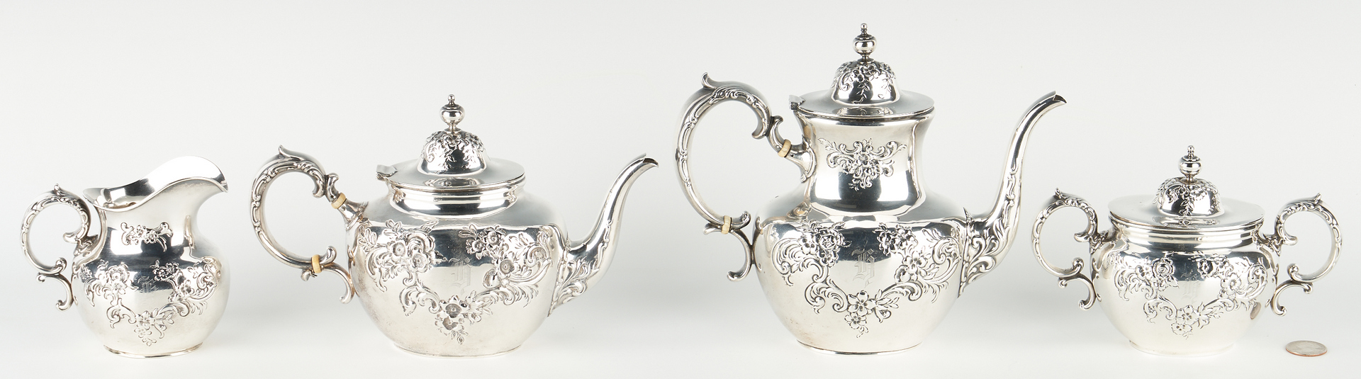 Lot 514: 4 Pcs. Whiting Sterling Silver Tea Set w/ Repousse Floral Design