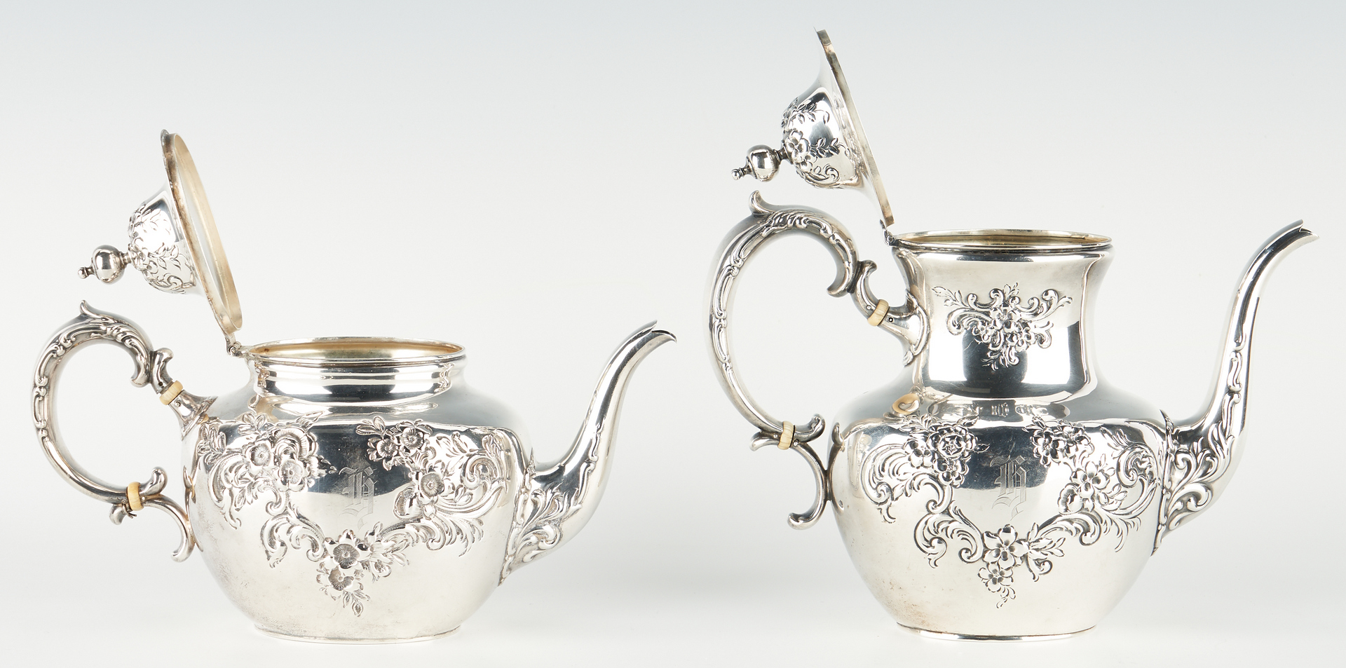 Lot 514: 4 Pcs. Whiting Sterling Silver Tea Set w/ Repousse Floral Design
