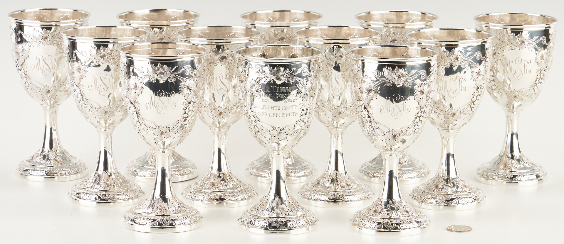 Lot 5: Set of 12 Chinese Export Sterling Silver Goblets, 11 marked Yu Chang