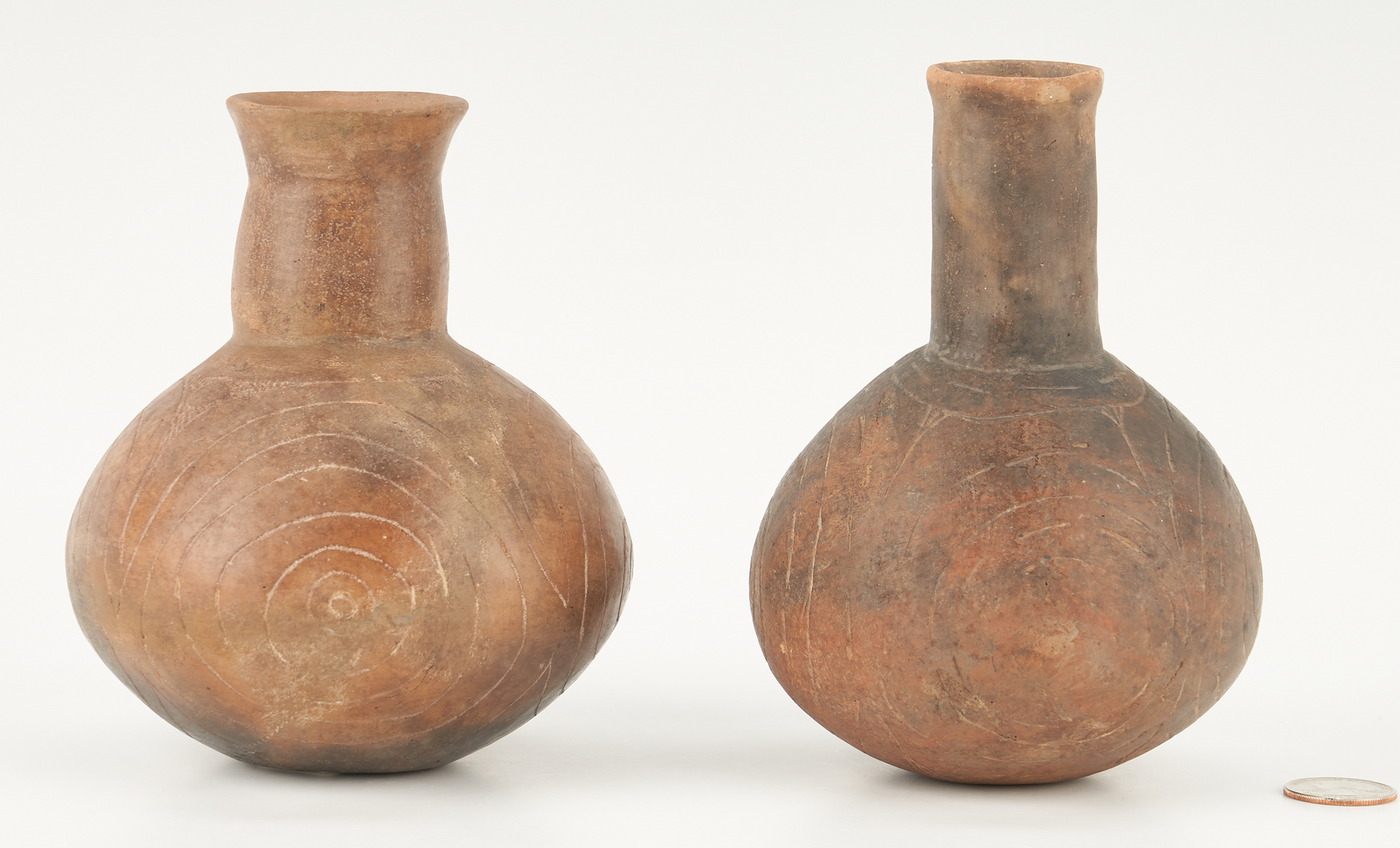 Lot 683: 2 Native American Caddo Culture Engraved Bottles